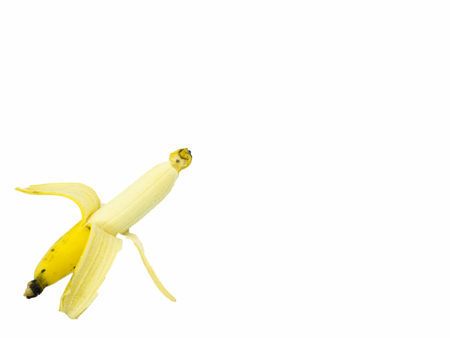 Peeled banana on isolated white background, top view, copy spaceの写真素材