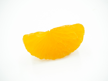 Slice of orange on isolated white backgroundの写真素材