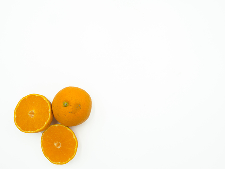 Slice of orange on isolated white background, top view, copy spaceの写真素材