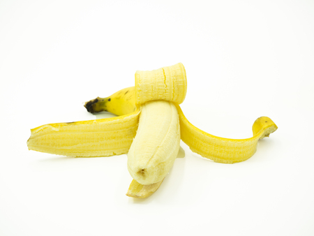 Peeled banana on isolated white backgroundの写真素材