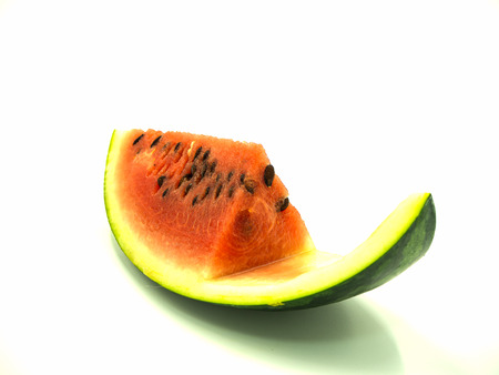 Slice of watermelon on isolated white backgroundの写真素材