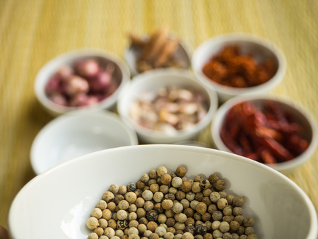 Closeup Pepper in the white cup, curry raw material backgroudの写真素材