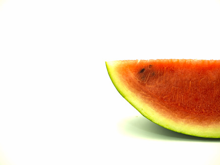 Slice of watermelon on isolated white backgroundの写真素材