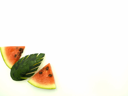 Slice and skin of watermelon on isolated white background, top view, copy spaceの写真素材
