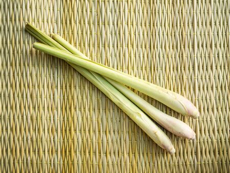 Lemon grass on the brown matの写真素材
