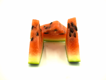 Slice of watermelon on isolated white backgroundの写真素材