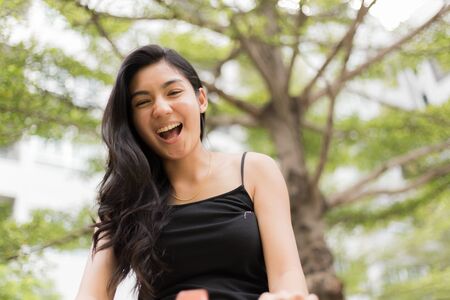 A portrait of a beautiful asian woman smilingの写真素材