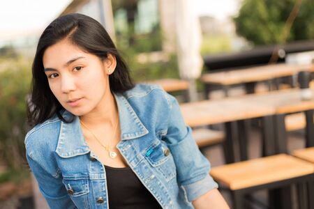 Beautiful young Asian woman in the cafeの写真素材