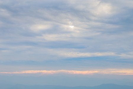 Beautiful cloudy weather over mountains, cloudy and fog in the moring with sunriseの写真素材