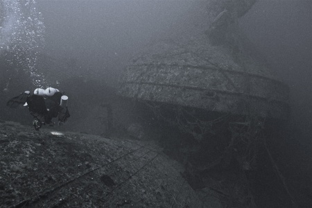 A technical diver on a wreck at 180 ftの写真素材