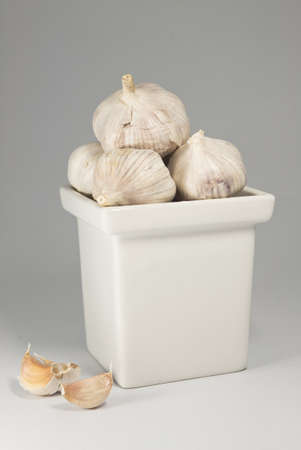 garlics on white vaseの写真素材