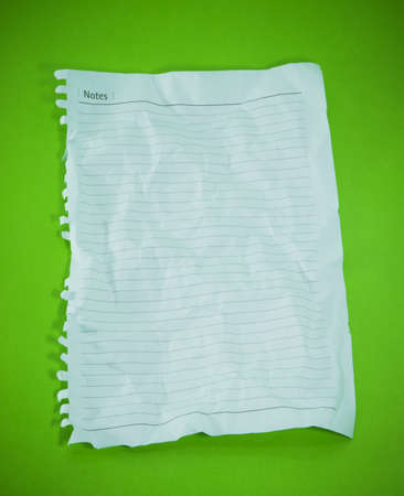 close up of note paper on a green background の写真素材