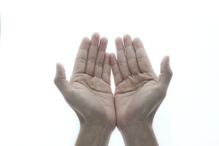 Male hands as if holding something. Focus on finger-tips の写真素材