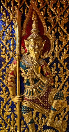 Thai molding art on the wall,  Thailand. の写真素材