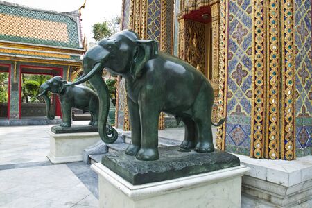 Marble statues of elephants at Thai temple の写真素材