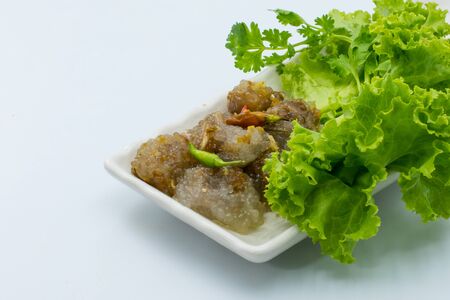 Thailand desser, Sago pork . Served on a plate with fresh vegetablesの写真素材