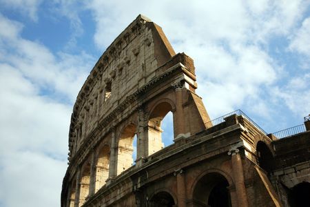 Old walls of Coliseum are in Rome, Italy