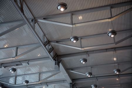 Lamps on a metal ceiling in a hangar