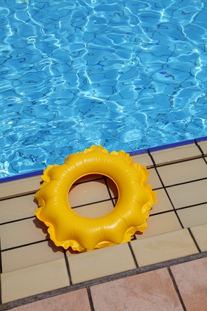 children's inflatable circle on the edge of the pool