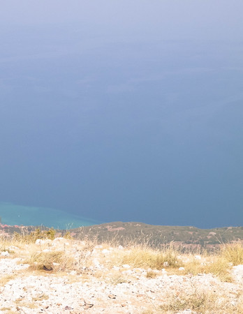 View form top of mountains in Galicica National Park, Macedonia. Galicica is a National Park between two lakes - Ohrid and Prespa Lake, known of it's wild nature. Offroad in Macedonia, balkan nature and exploration concept. Copy space.の写真素材