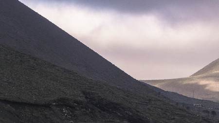 Mountain landscape of north part of Lanzarote island. Beautiful, wild, tropical nature of Lanzarote island. Wild flora and exploration concept.の写真素材