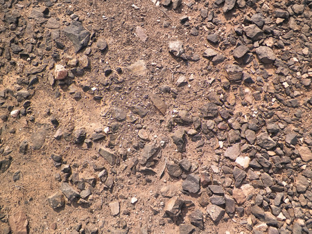 Brown, Canarian desert and rocks as background. Typical Lanzarote island soil. Copy space, nature concept.の写真素材