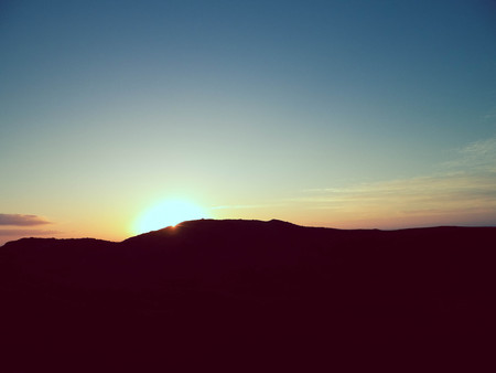 Beautiful sunset over Montana Roja, Lanzarote. Montana Roja is a volcano on Lanzarotte, Canary Islands.の写真素材