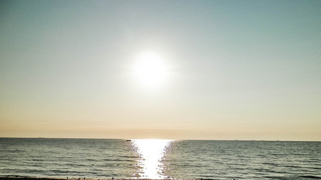 Sunrise over a sandy beach by the Baltic Sea, Poland.. Polish nature and exploration concept. Copy space.の写真素材