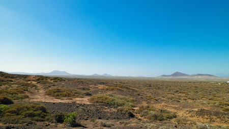 Desert landscape, Lanzarotte , Canary Islands. Desert is typical landscape on Lanzarote island. Travel and nature concept.の写真素材