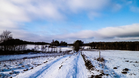 Offroad over Kashubian country area in winter. Nature and weather season concept. Polish nature.の写真素材
