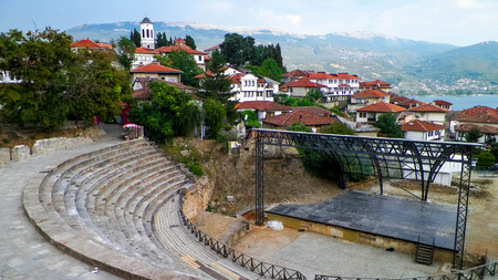 Old town in Ochrid City, amphitheater and water of Ochrid Lake as background. Architecture and tourism concept.の写真素材