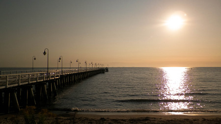 Sunrise over pier in Gdynia, Poland. Beautiful polish nature, baltic sea and summer concept.の写真素材