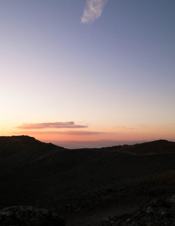 Beautiful sunset over extinct volcano Montana Roja. Montana Roja is a volcano on Lanzarotte, Canary Islands. Copy space on colorful sky.の写真素材