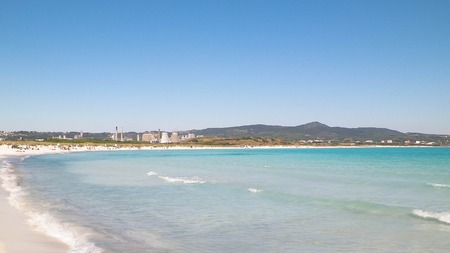 Coast and beach in Vada, Italy. Transparent, turquoise water and white sand. Travel and nature concept.の写真素材