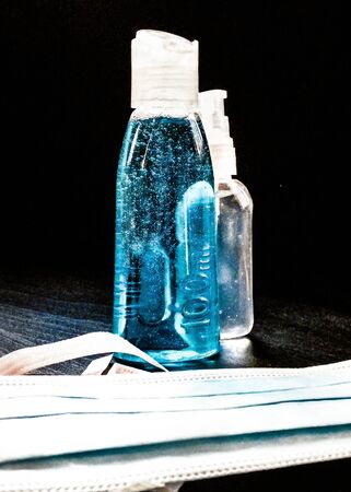 Antibacterial fluid and mask. Coronavirus protection kit. Hygiene is very important to avoid infection of voronavirus.の写真素材