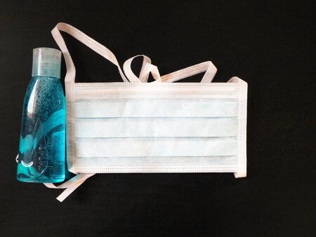 Antibacterial fluid and mask. Coronavirus protection kit. Hygiene is very important to avoid infection of voronavirus.の写真素材