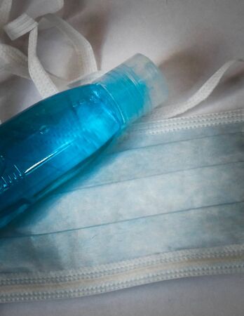 Antibacterial fluid and mask. Coronavirus protection kit. Hygiene is very important to avoid infection of voronavirus.の写真素材
