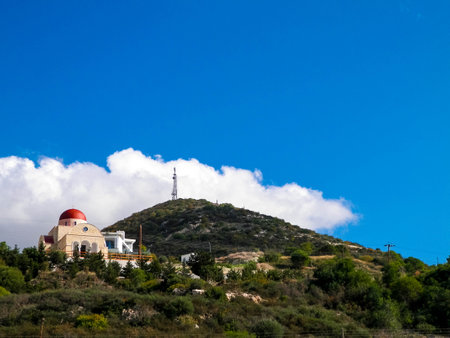 Small orthiodox Church and radio station on Tsiarta mountain in a background. Cyprusの写真素材