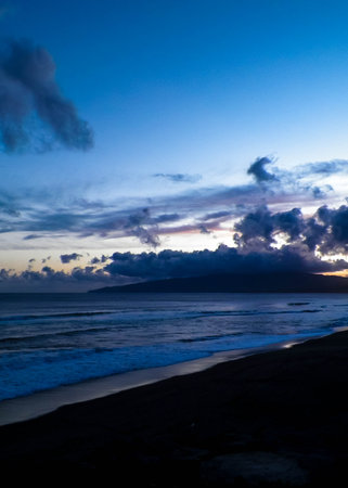 Dramatic sky after sunset over Atlantic Ocean, Ribiera Grande, Azores Islands.の写真素材