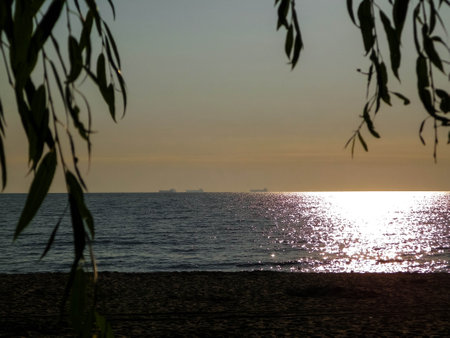 Sunrise over Baltic Sea and sandy beach of Gdynia, Poland. Travel and nature concept.の写真素材
