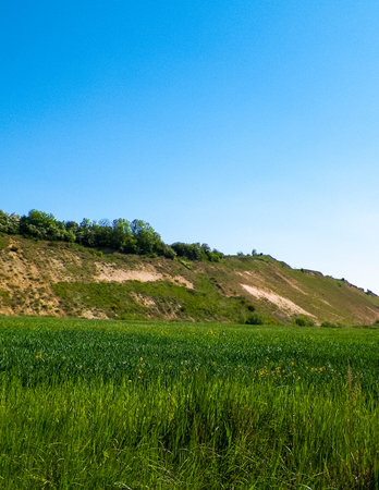 Gravel pit in mining area. Northern Poland. Copy space on sky. Natural environment exploration concept.の写真素材