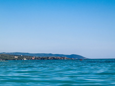 Summer day, blue, Tyrrhenian sea water on blue sky background. Vacations and nature concept. copy space.の写真素材
