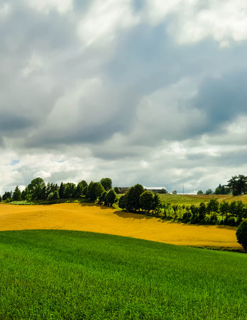 Cloudy day in Kashubia Poland. Clouds are gathering over the hills. Storm is coming. Beauty of...