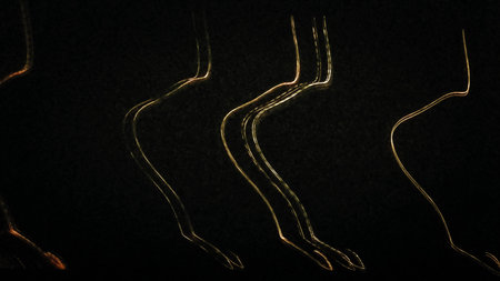 Abstract lights on black background. Copy space.