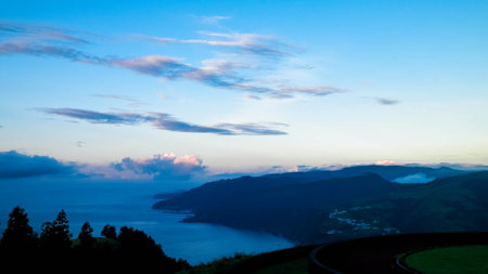 Stunning sunset over coast in Sao Miguel island. Sao Miguel is the biggest island of Azores Archipelago.の写真素材
