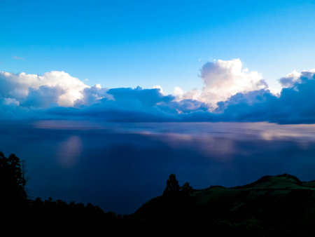 Stunning sunset over coast in Sao Miguel island. Sao Miguel is the biggest island of Azores Archipelago.の写真素材