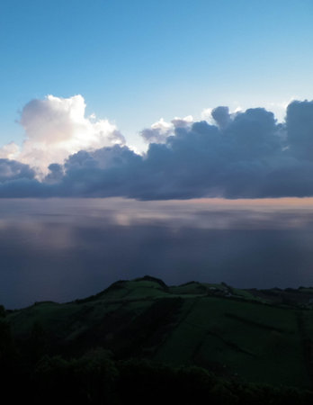 Stunning sunset over coast in Sao Miguel island. Sao Miguel is the biggest island of Azores Archipelago.の写真素材
