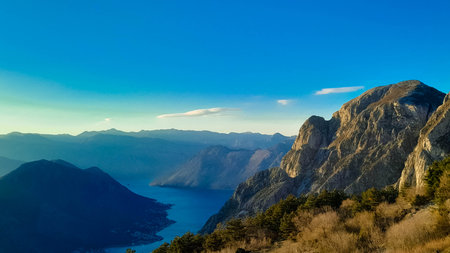 Lovcen mountain peaks on a sunny day. The Lovcen Mountains lie around Boka Kotorska in Montenegro. Kotorska bay in a foreground.の写真素材