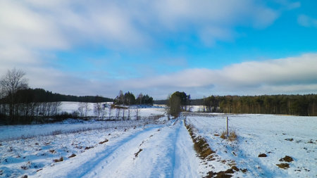 Offroad over Kashubian country area in winter. Nature and weather season concept. Polish nature.の写真素材