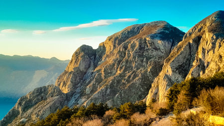 Lovcen mountain peaks on a sunny day. The Lovcen Mountains lie around Boka Kotorska in Montenegro. Montenegro is a popular tourist destination in the Balkans.の写真素材